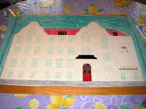 Nun male ich mit Lebensmittelfarbe die Zeichnung aus und den Himmel dahinter.